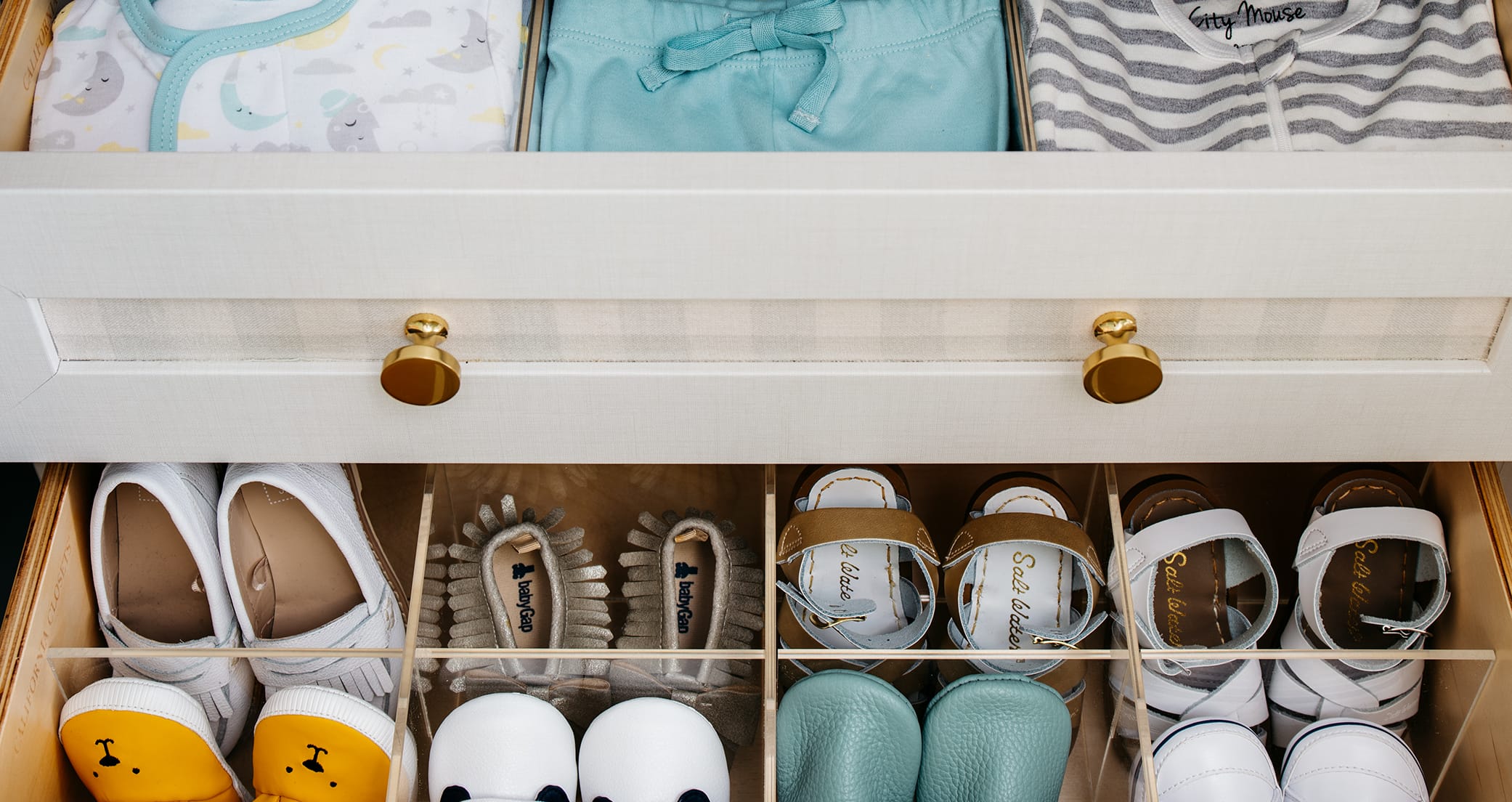 Dina Bandman's child's closet drawer with organizers to keep wardrobes neat and in place created by California Closets