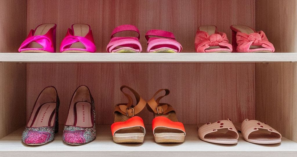 Joy Cho's custom shoe storage in light wood finish created by California Closets