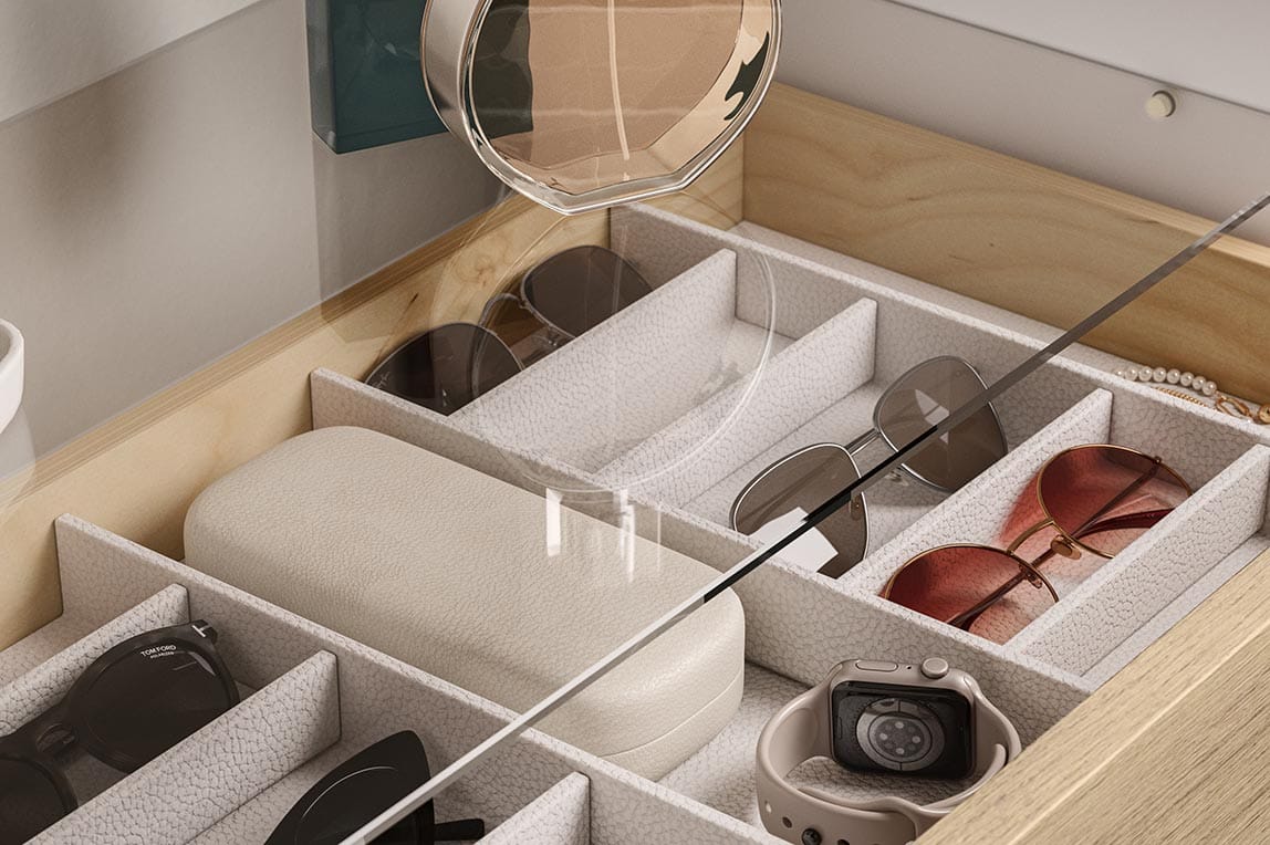 Custom drawer for accessories with glass top shelf design for glasses made by California Closets