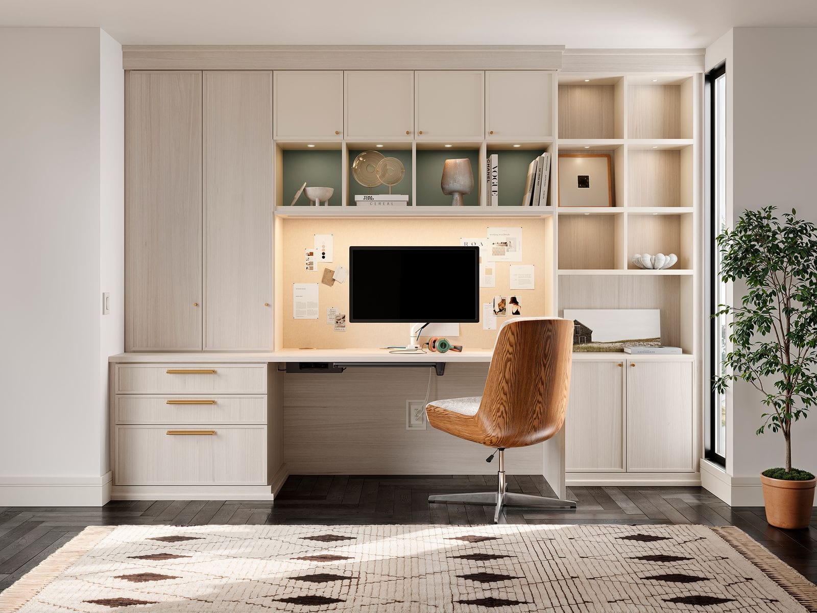 Home office featuring custom shelving, cabinetry, and desk area by California Closets
