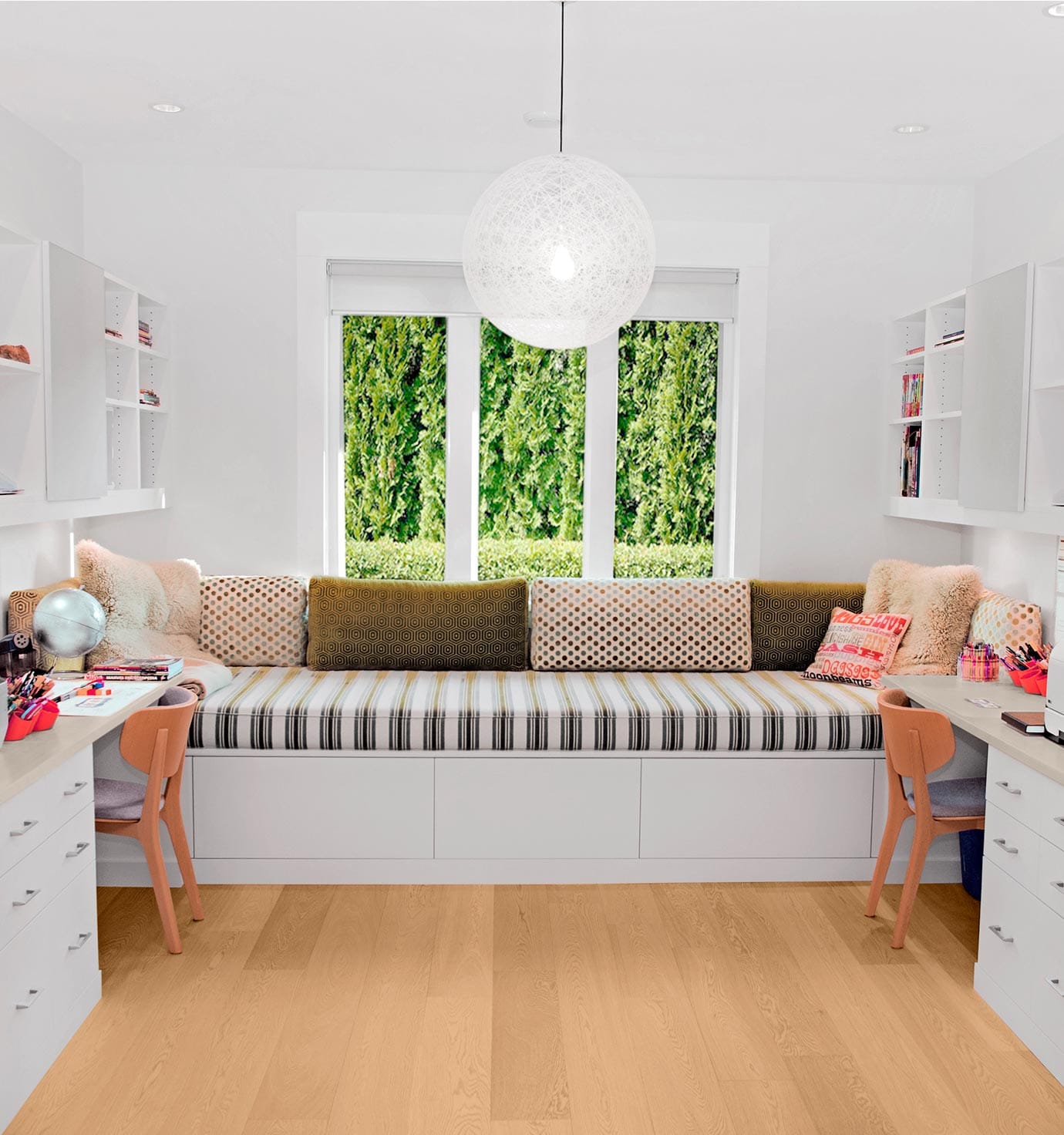 Family workspace with built in shelves, drawers, desks, bench in Classic White finish by California Closets