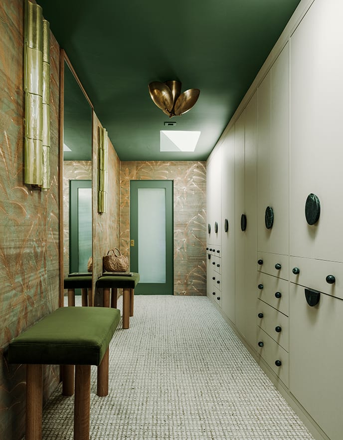 Long hallway in Palm Springs with custom organized cabinets, closets, drawers shared with California Closets