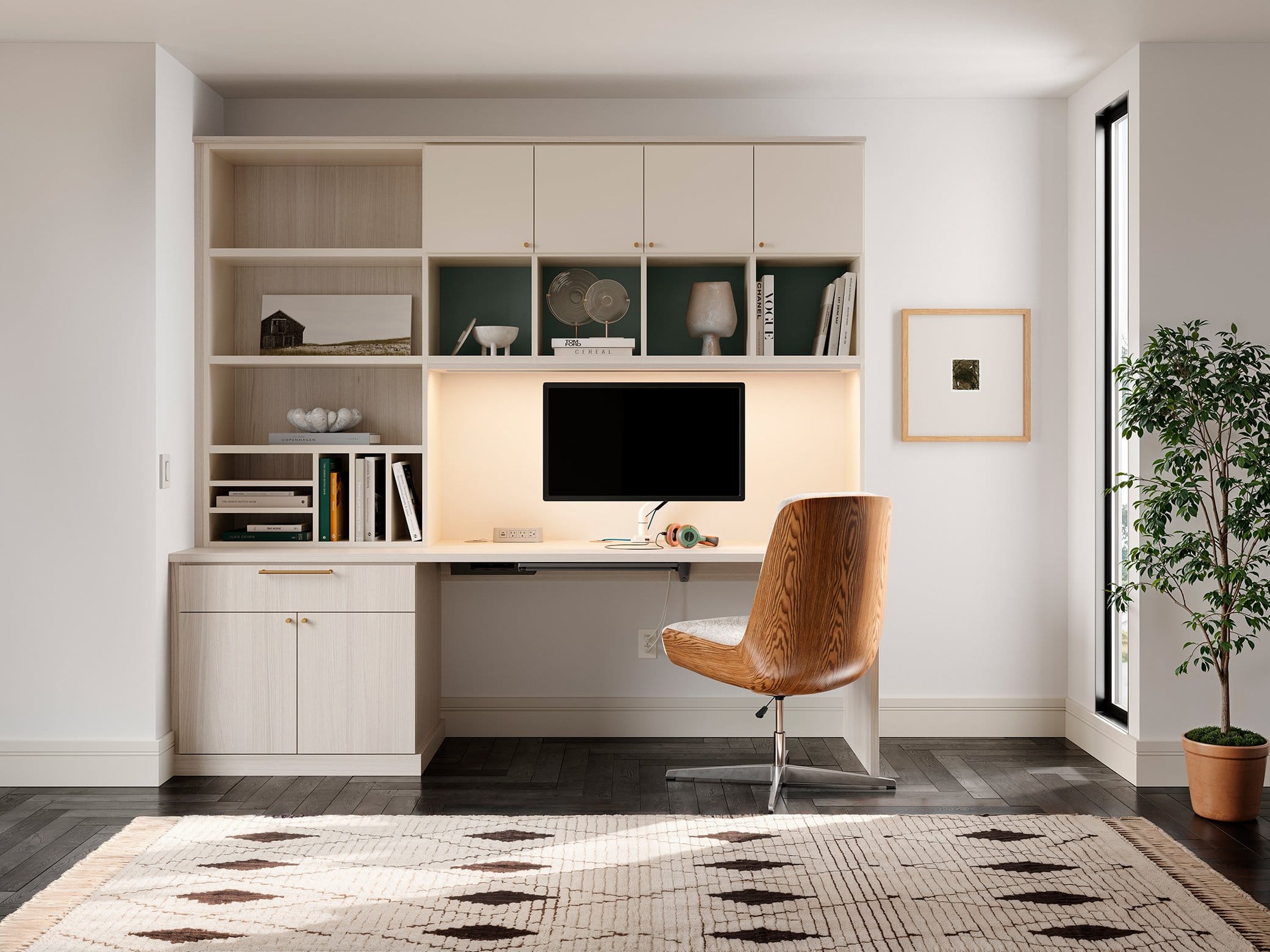 Custom built home office area with cabinets and custom table made by California Closets