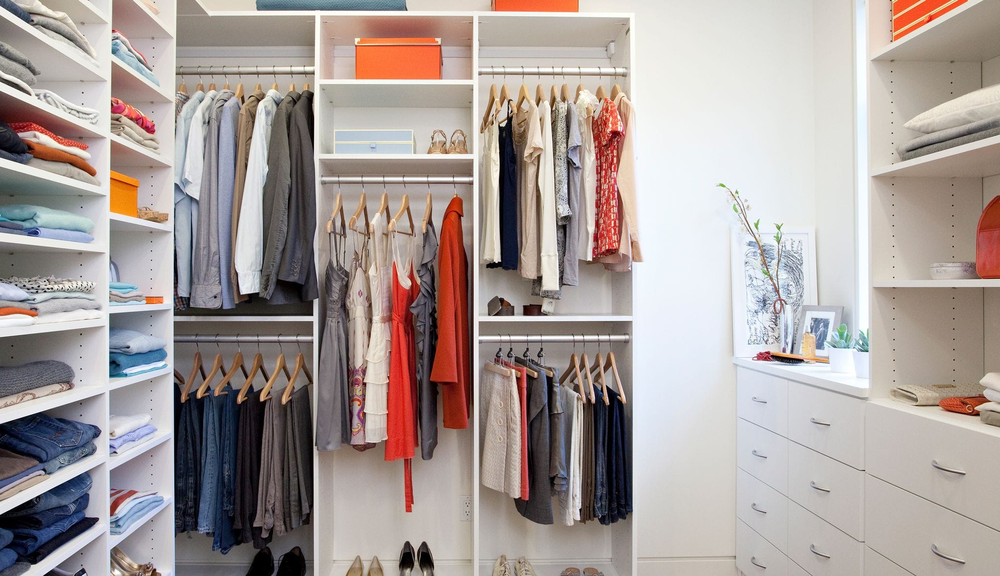 White-finish closet with shelving and shoe storage installed by California Closets