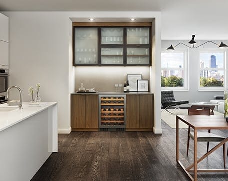 Custom entertainment center living room design ideas and walk in closet storage cabinets and shelving by California Closets