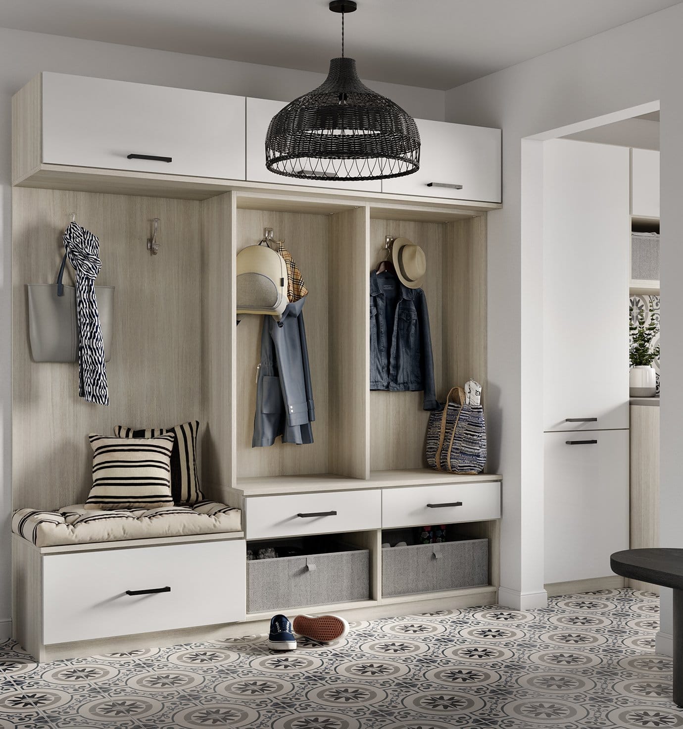 Mudroom storage space with organization and custom cabinets, and drawers by California Closets